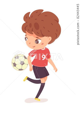 Boy kicking ball by leg at football practice. Happy little kid playing sport in uniform vector illustration. Smiling child kicking ball near floor by foot on white background 82443445