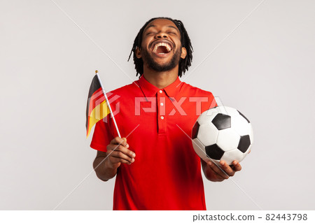 Portrait of young emotional african man on gray background. Portrait of young emotional african man on gray background. 82443798