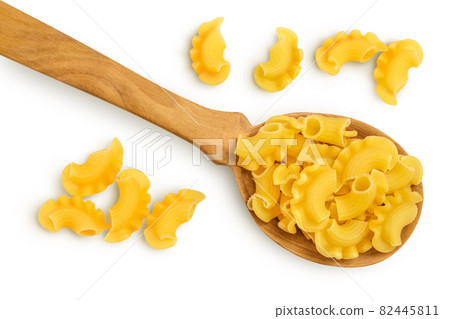 Pasta cornetti creste macaroni isolated on white background with clipping path and full depth of field. Top view. Flat lay 82445811