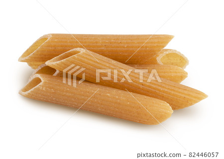 Wolegrain penne pasta from durum wheat isolated on white background with clipping path and full depth of field. Wolegrain penne pasta from durum wheat isolated on white background with clipping path and full depth of field. 82446057