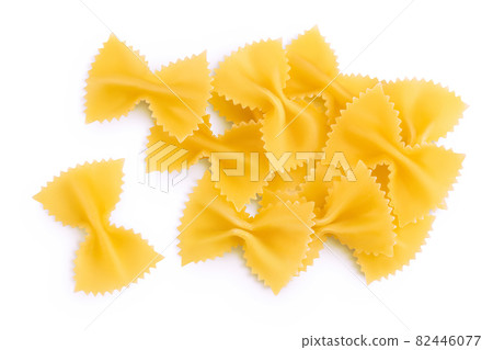 Bow tie pasta isolated on white background with clipping path and full depth of field. Top view. Flat lay. Bow tie pasta isolated on white background with clipping path and full depth of field. Top view. Flat lay. 82446077