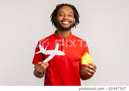 Portrait of young emotional african man on gray background. Portrait of young emotional african man on gray background. 82447167