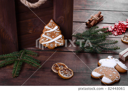 Christmas festive gingerbread made at home on a dark table 82448061