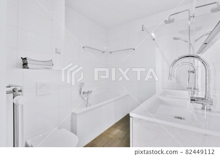Luxury interior design of a bathroom with marble walls Luxury interior design of a bathroom with marble walls 82449112