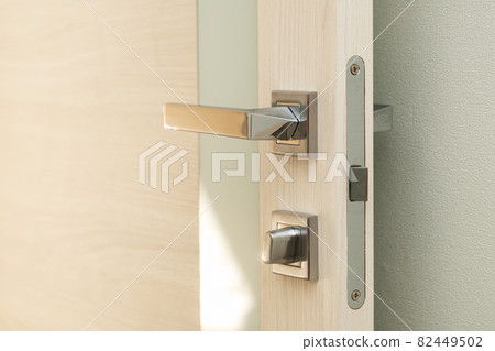 Contemporary opened door with a glass stripe with a nickel-plated handle and a latch Contemporary opened door with a glass stripe with a nickel-plated handle and a latch 82449502