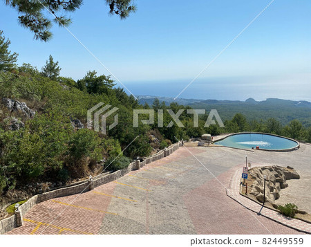Pool by the sea on a background of blue sky 82449559
