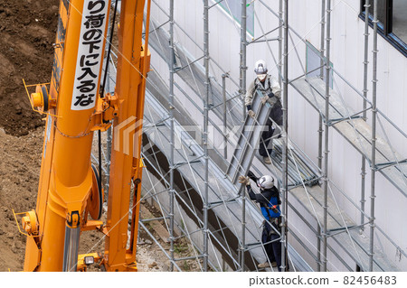 Construction site scaffolding crane 82456483
