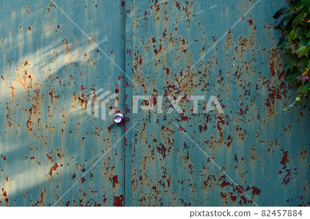 Rusted and old bronze iron gate Rusted and old bronze iron gate 82457884