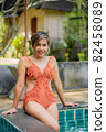 Portrait of Asian women wear swimsuits Background swimming pool 82458089