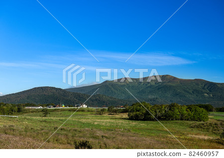 Mt. Kurikoma and plateau ranch in autumn Mt. Kurikoma and plateau ranch in autumn 82460957