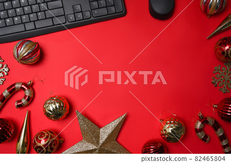 Red and gold Christmas ornaments decoration on red background. Christmas holiday celebration concept. 82465804