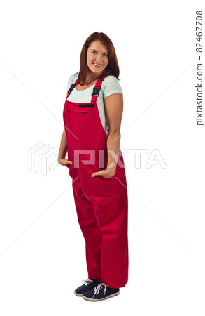 woman in red overalls  , isolated on white 82467708