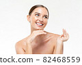 Smiling young beautiful Caucasian woman with healthy clear fresh skin 82468559