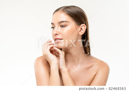 Attractive young Caucasian woman with healthy glowing face skin for skincare and beauty concept Attractive young Caucasian woman with healthy glowing face skin for skincare and beauty concept 82468563