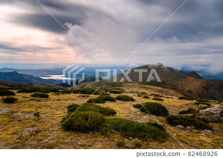 Maliciosa Peak in Guadarrama Mountain Range a foggy day Maliciosa Peak in Guadarrama Mountain Range a foggy day 82468926