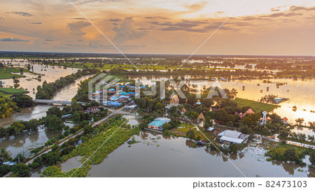 aerial view images from drone of Community and agricultural regions are being flooded. 82473103