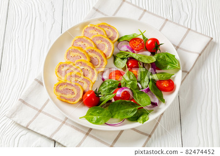 ham and cheese breakfast egg roll-ups, pinwheels 82474452