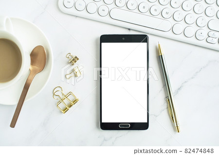 Coffee and mobile phone mock-up on marble background 82474848