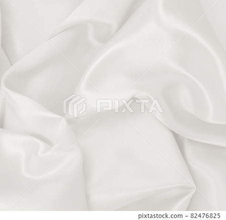 Smooth elegant golden silk or satin luxury cloth texture as wedding background. Luxurious background design. In Sepia toned. Retro style Smooth elegant golden silk or satin luxury cloth texture as wedding background. Luxurious background design. In Sepia toned. Retro style 82476825