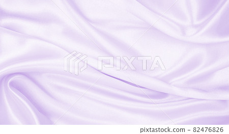 Smooth elegant lilac silk or satin texture as wedding background. Luxurious background design Smooth elegant lilac silk or satin texture as wedding background. Luxurious background design 82476826
