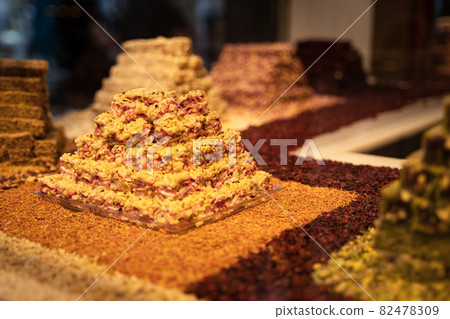 rows of Turkish delight sweets lined up in window 82478309