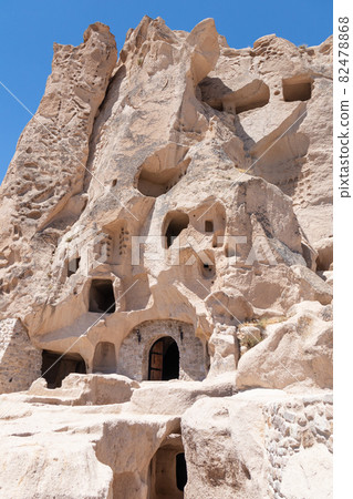 Unique fortress Ukhchisar. Large cave house in Cappadocia, Turkey. Unique fortress Ukhchisar. Large cave house in Cappadocia, Turkey. 82478868