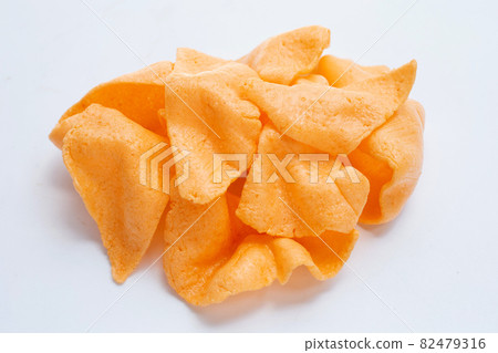 Prawn crackers on white background. Shrimp crispy rice snack Prawn crackers on white background. Shrimp crispy rice snack 82479316