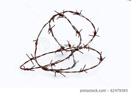 Rusty barb wire isolated on white background 82479365