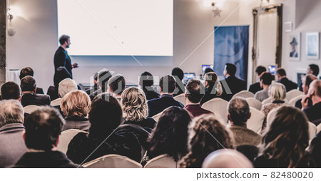 Public speaker giving talk at Business Event. Public speaker giving talk at Business Event. 82480020