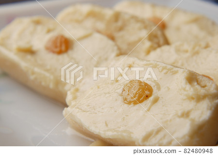 close up of indian sweet in a bowl on table. close up of indian sweet in a bowl on table. 82480948