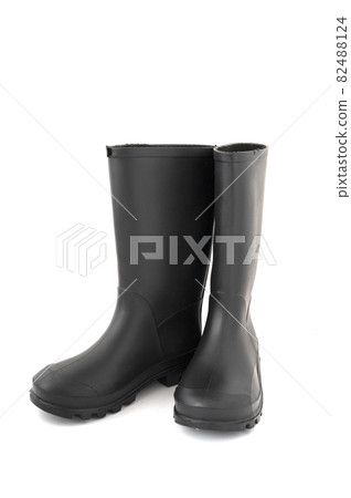 Pair of black high rubber boots, rain boots isolated on white 82488124