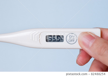 Hand with thermometer Hand with thermometer 82488254