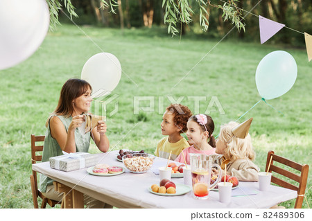 Mother with Kids at Birthday Party 82489306