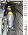 Bombs loaded on fighter planes 82492529