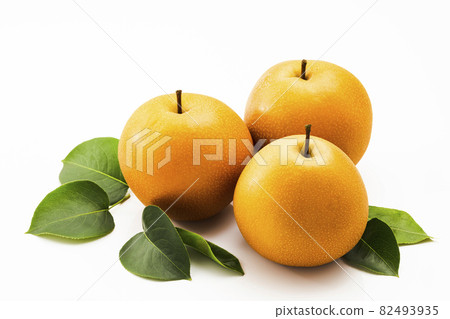 Pear with leaves on a white background Pear with leaves on a white background 82493935