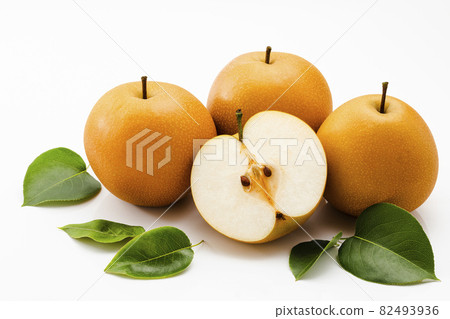 Pear with leaves on a white background Pear with leaves on a white background 82493936
