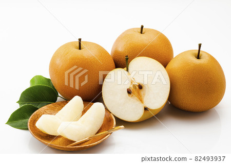 Pear with leaves on a white background Pear with leaves on a white background 82493937