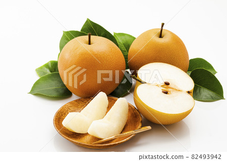 Pear with leaves on a white background Pear with leaves on a white background 82493942