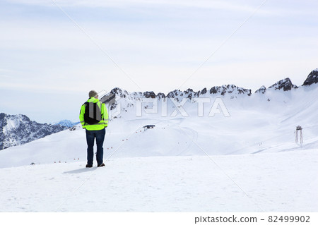 Snow covered mountain peak winter and tourist 82499902
