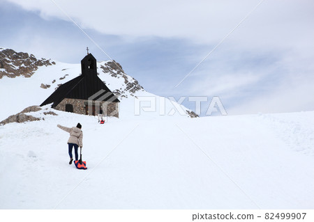 Snow covered mountain peak winter and tourist 82499907