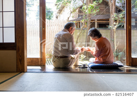 Country life: Senior couple enjoying alcohol from noon 82516407