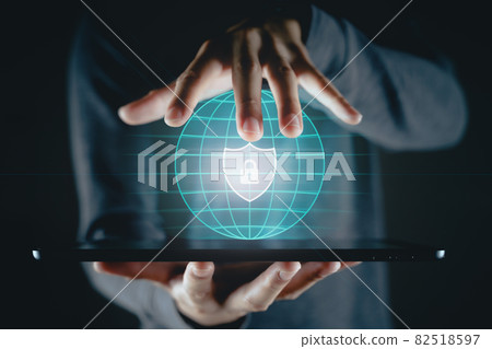 Man holding tablet with padlock shield protects security icon on the virtual display.  Cyber security safe data protection business technology privacy concept. Information security system. 82518597