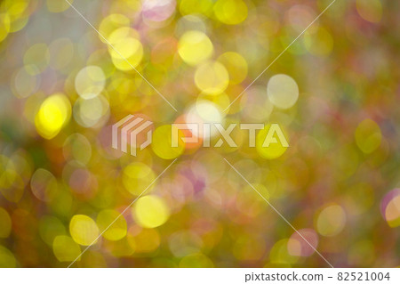 Vivid lights glittering with golden color Vivid lights glittering with golden color 82521004