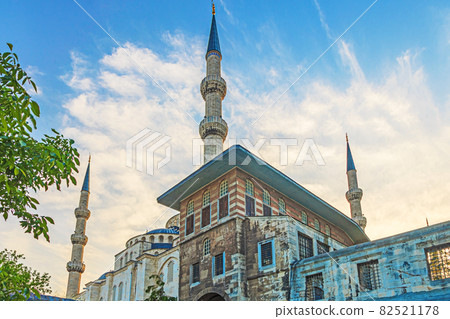 View of the minarets of a mosque in Istanbul from the ground perspective against the blue sky in the background 82521178