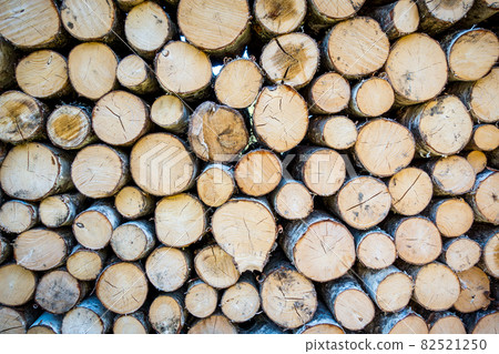 Stack of tree trunks. Texture background Stack of tree trunks. Texture background 82521250