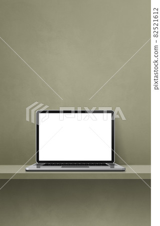 Laptop computer on green shelf. Vertical background 82521612