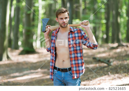 Lumbersexual trend. Bearded man carry axe natural landscape.  82521685