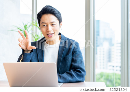 Businessman having a web conference in the office Shooting cooperation "+ SHIFT NO GIZAKA" Businessman having a web conference in the office Shooting cooperation "+ SHIFT NO GIZAKA" 82521804