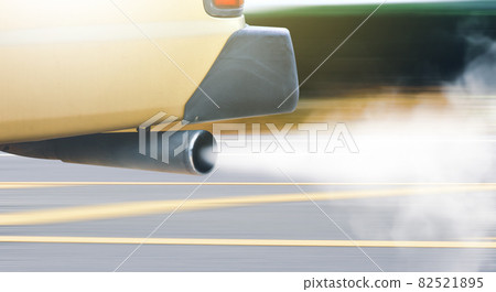Vehicle air pollution of old diesel engine with white color smoke on the road Vehicle air pollution of old diesel engine with white color smoke on the road 82521895