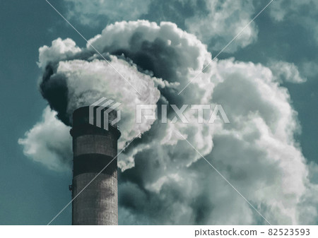 Environmental pollution, environmental problem, smoke from the chimney of a plant or thermal power plant against the sky Environmental pollution, environmental problem, smoke from the chimney of a plant or thermal power plant against the sky 82523593